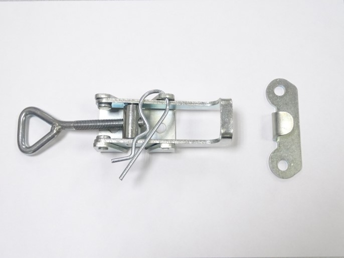 Замок для прицепа самосвальной системы