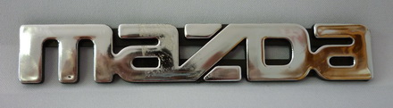 Эмблема  Mazda  надпись