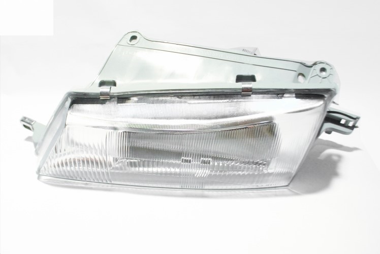 Фара Daewoo Nexia стар. образца левая /эл.корр./